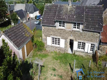 Maison en pierre avec dépendances proche commerces