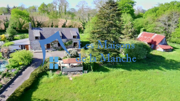 Magnifique maison normande en pierre avec dépendances sur un terrain arboré de plus de 8 000 m²