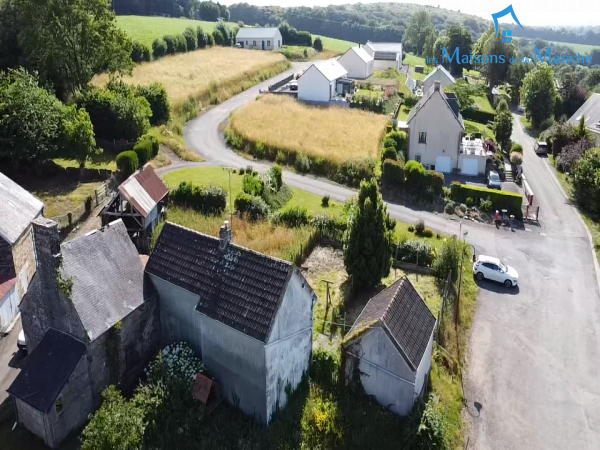 Maison en pierre avec dépendances proche commerces