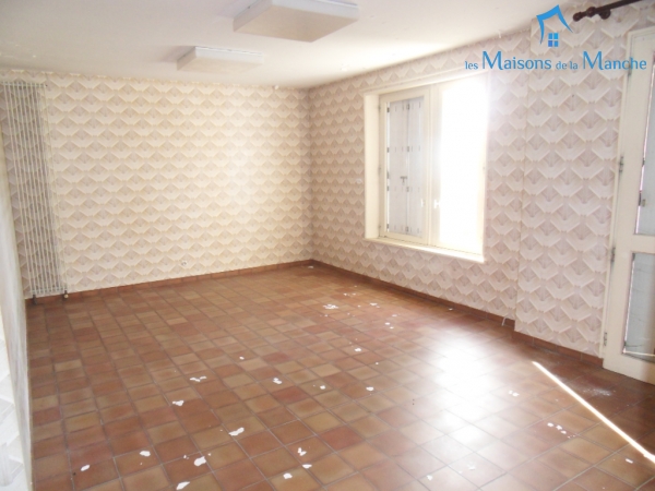 Ensemble de 3 logements 352 m² dans le bourg de BRECEY (50370)