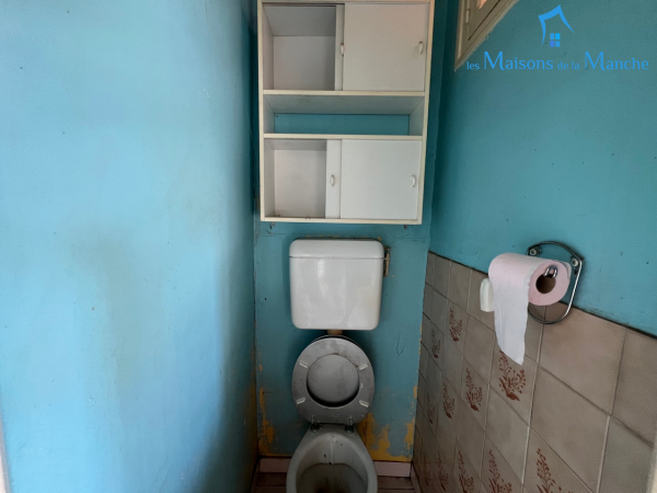 Maison en pierre avec dépendances proche commerces