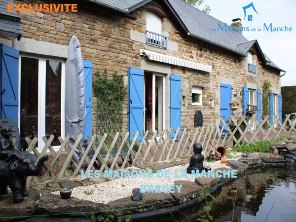 Longère en pierre couverte en ardoise de 247 m² + 92 m² de dépendances