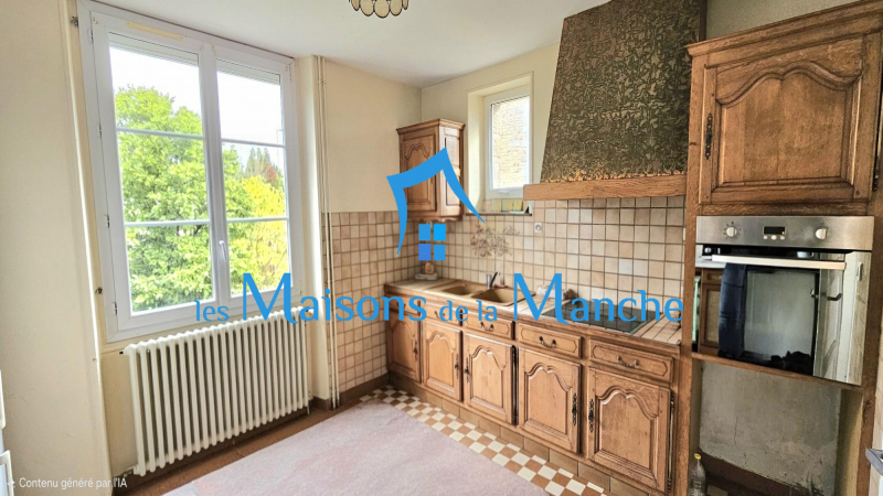 Grande maison en pierre avec grand terrain arboré, aux portes de Saint-Hilaire-du-Harcouët