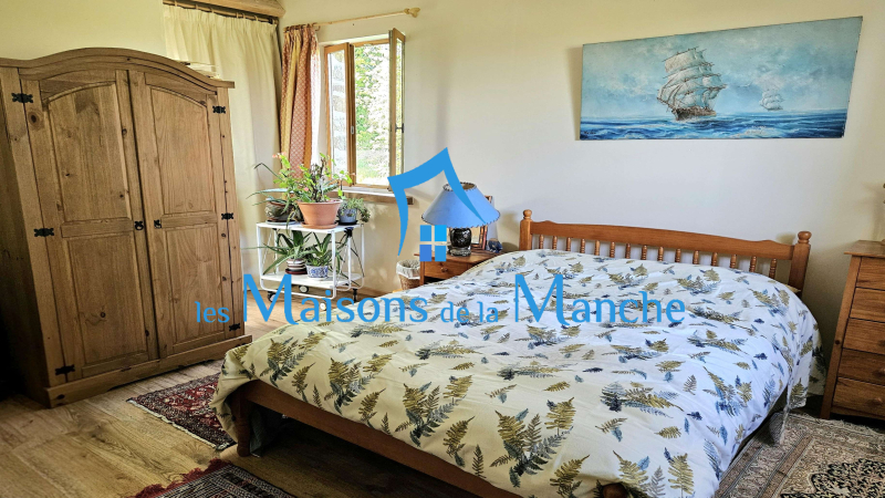 Magnifique maison normande en pierre avec dépendances sur un terrain arboré de plus de 8 000 m²