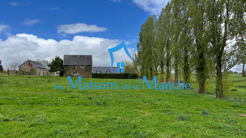 Bâtiment en pierre couvert en ardoise