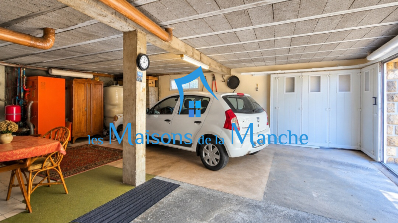 Maison avec 2 chambres sur sous-sol complet avec terrain de 1 187 m² et vue sur la campagne à Poilley
