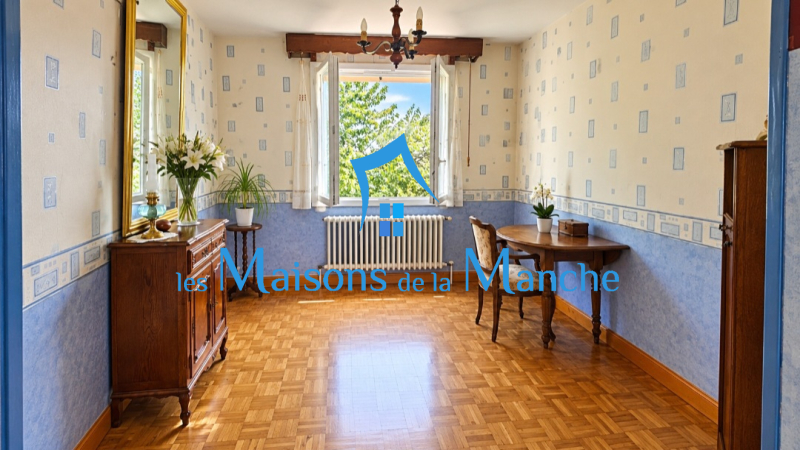 Maison avec 2 chambres sur sous-sol complet avec terrain de 1 187 m² et vue sur la campagne à Poilley