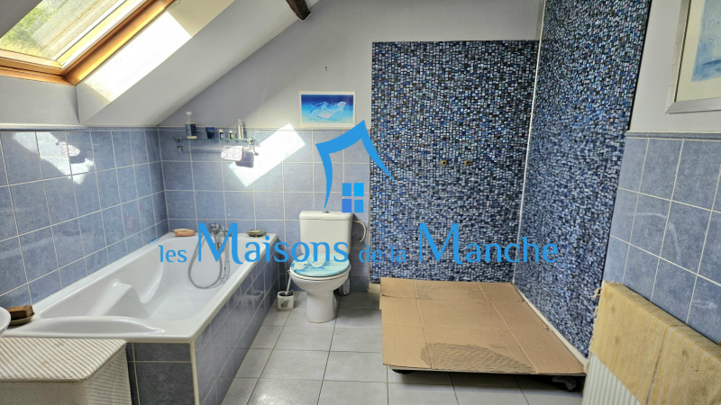 Magnifique maison normande en pierre avec dépendances sur un terrain arboré de plus de 8 000 m²