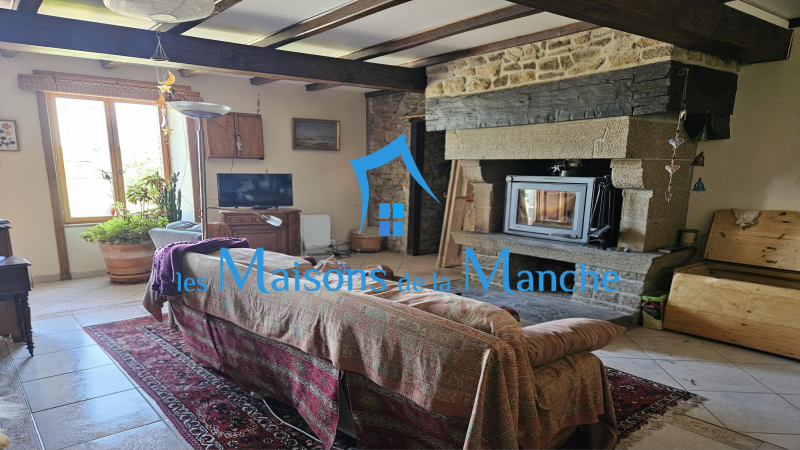 Magnifique maison normande en pierre avec dépendances sur un terrain arboré de plus de 8 000 m²