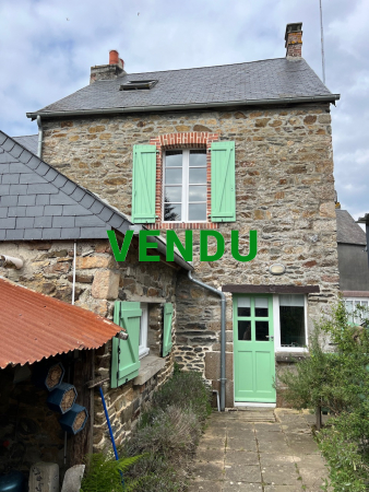 Maison de bourg en bord de rivière